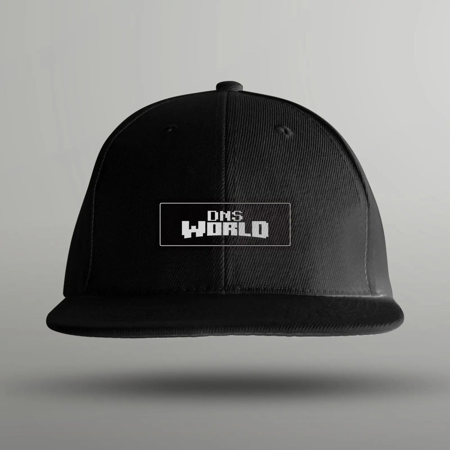 black baseball cap with the DNSworld logo on the front